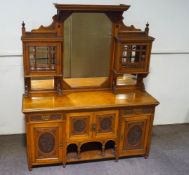 A late Victorian oak mirror back sideboard,