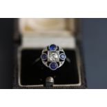 An Art Deco style sapphire and diamond oval cluster ring,