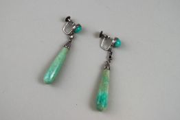 A pair of green mottled jadeite 'pippin drop' earrings,