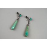 A pair of green mottled jadeite 'pippin drop' earrings,