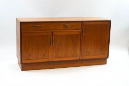 A 1970's G-Plan sideboard with single drawer and two cupboards,