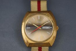 Nappey, automatic, a 1970's gold-plated tonneau-shaped wrist watch,