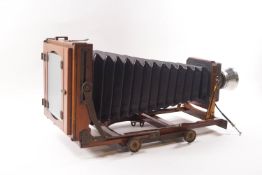 A 19th century plate camera fitted with an Actina 42 lens,