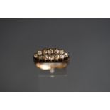 An early 20th century diamond boat-shaped cluster ring, the 12 old-cut stones approx. 1.