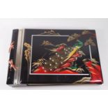 A Japanese lacquered musical photograph album, the cover with peacock decoration,