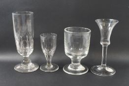 A 19th century drinking glass with flared bowl, plain stem and fold over foot, 16cm high,