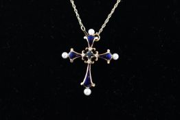 The Midnight Sapphire 14K Cross by Igor Carl Faberge, an enamel and gem-set cross pendant,