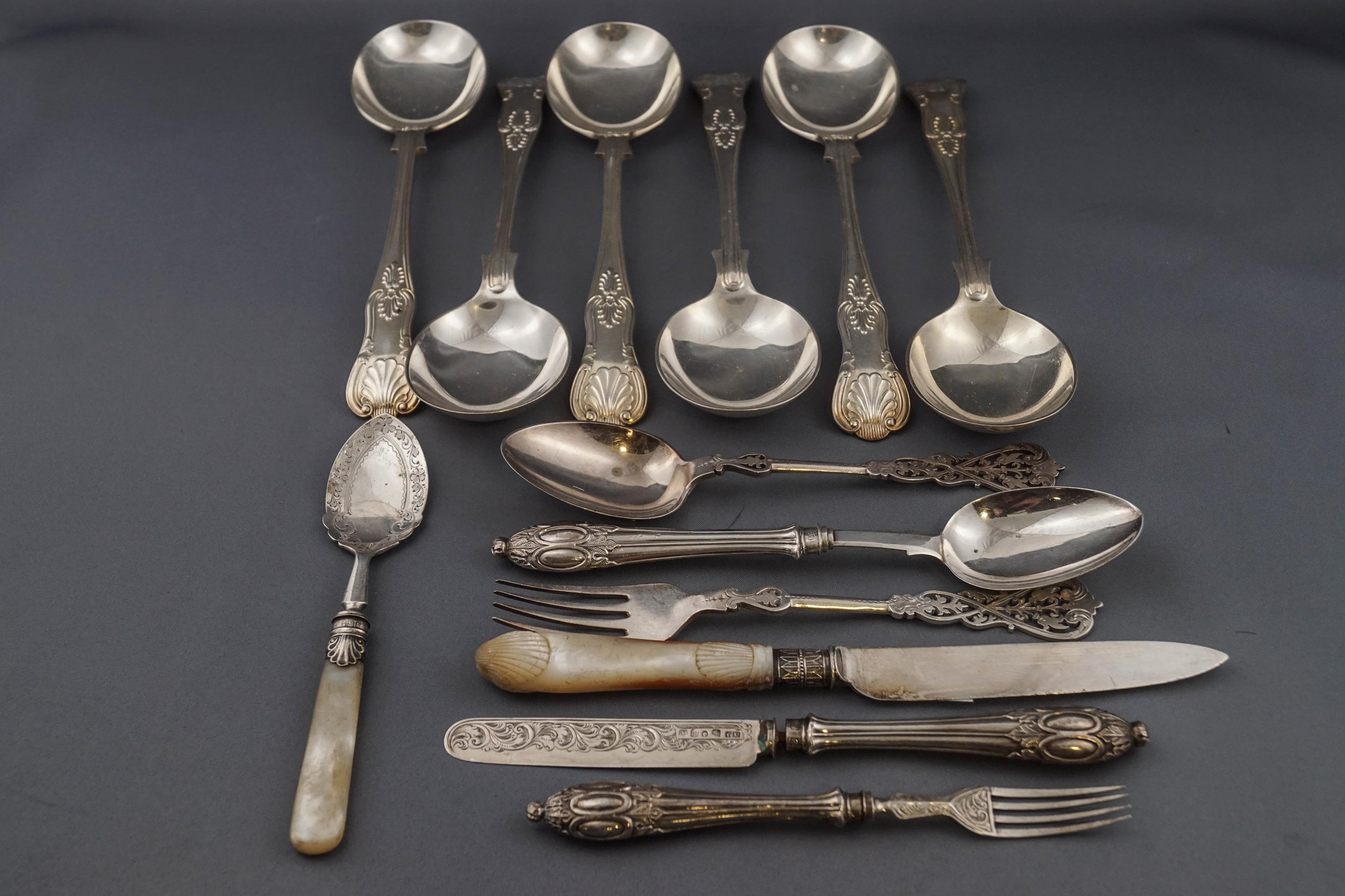 A Victorian silver christening knife, fork and spoon set with filled handles,