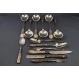 A Victorian silver christening knife, fork and spoon set with filled handles,