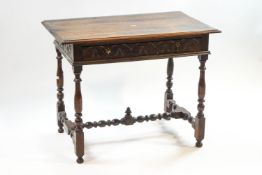 A 19th century oak side table with single drawer, on turned and block supports,