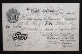 A Bank of England white five pound note, numbered P27 020797,