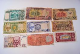 Various bank notes, including English ten shillings, Belgium francs, Indian rupees,
