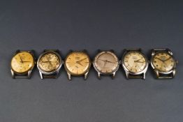 Six various vintage stainless steel wrist watch heads, circa 1940-1960,