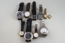 A miscellaneous collection of lady’s and gentleman’s wrist watches,