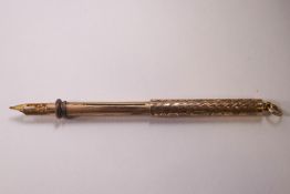 An early 20th century rose gold combined propelling pen & pencil,