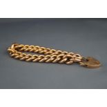 An early 20th century rose gold hollow curb bracelet, apparently unmarked,