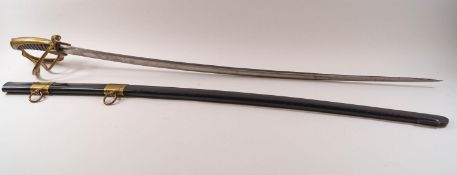 A 20th century French Officer's sword and metal scabbard, the sword engraved 'Eleve Officer PETIT E.