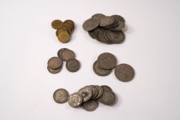 A quantity of English coinage including shillings, Victorian pennies, three pences,
