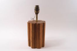 A turned wood octagonal lamp base by John Makepiece, stamped to the underside,