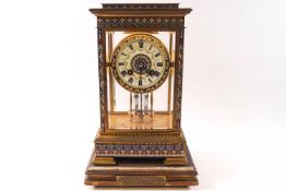 A late Victorian brass cloisonne and champleve enamel mantel clock,