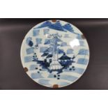 A 19th century Chinese plate decorated in underglaze blue,