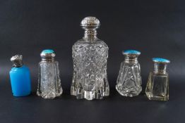 A silver mounted cut glass scent bottle, Birmingham 1909, 13.