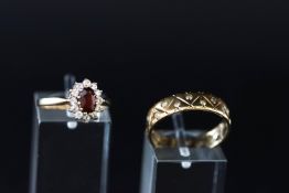 Two 9ct gold and gem rings, comprising; a garnet and CZ cluster ring, Edinburgh 1987,