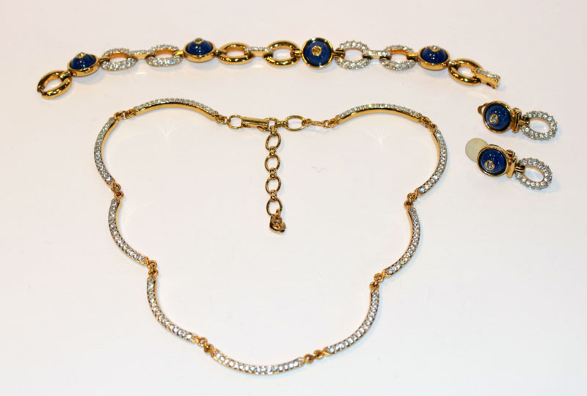 Swarovski Modeschmuck-Set: Collier, Armband und Paar Ohrclips, in Originaletui