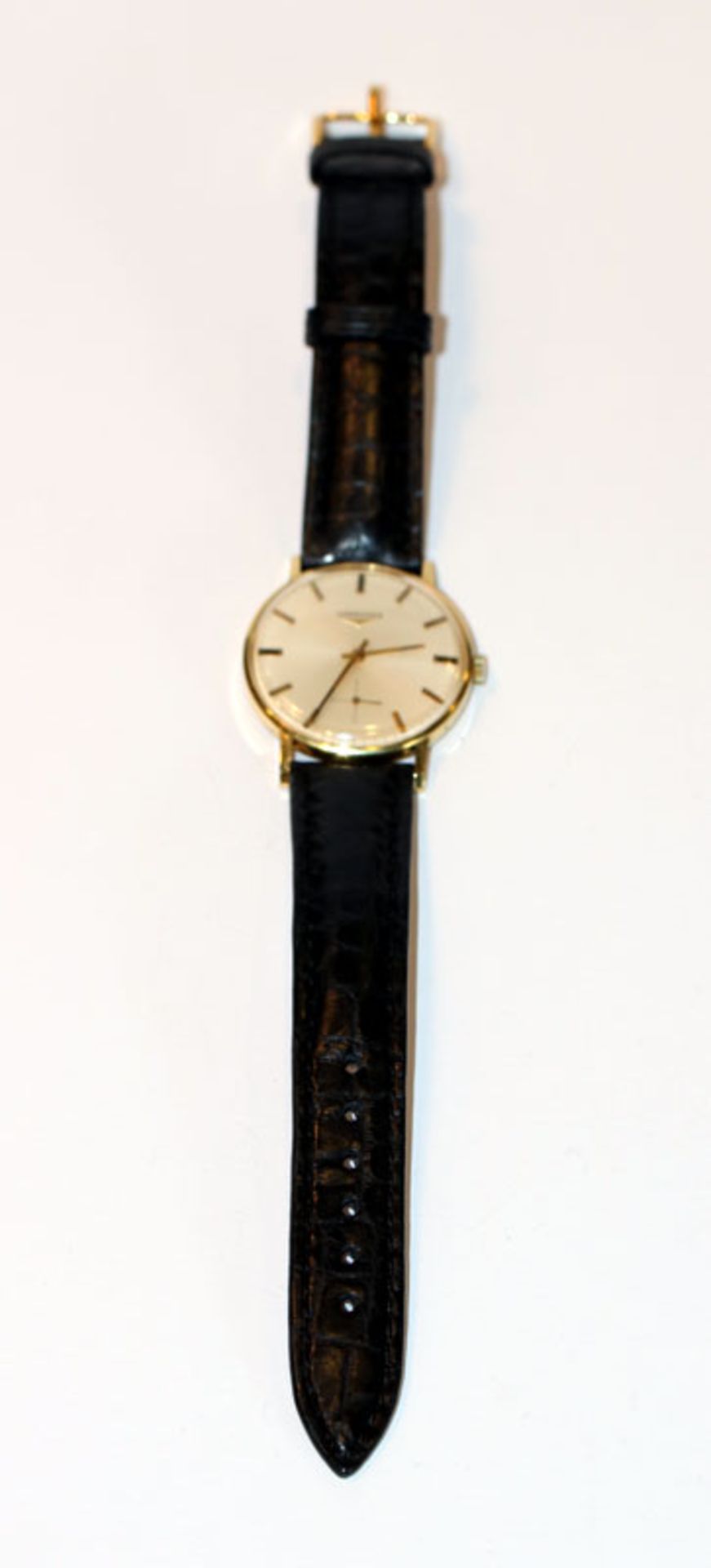 Longines Armbanduhr, 18 k Gelbgold Gehäuse, mechanisches Werk, intakt, an schwarzem Kroko-Armband,