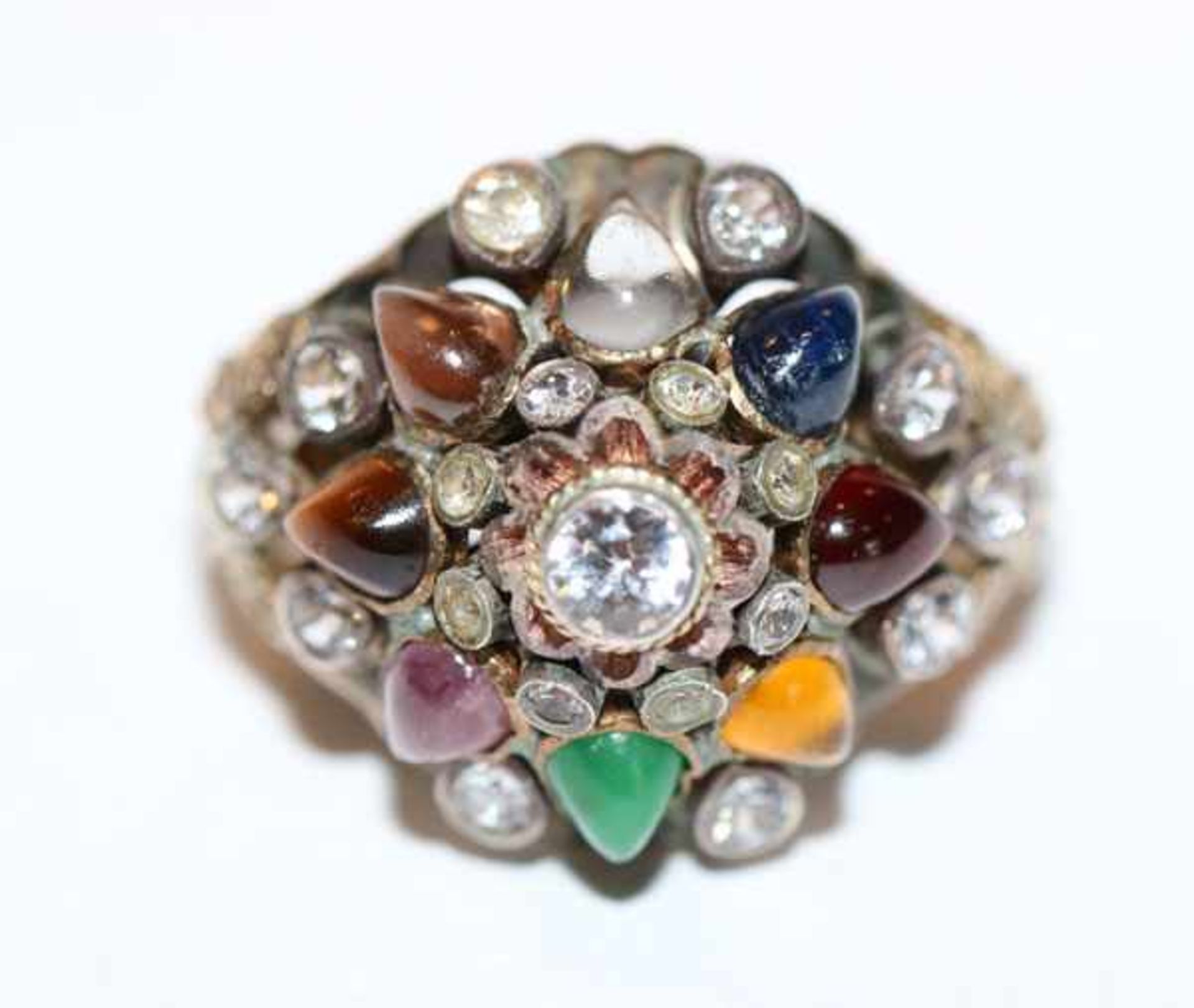 Dekorativer Ring, vergoldet, teils Silber mit Farb- und Glassteinen besetzt, ausgefallene