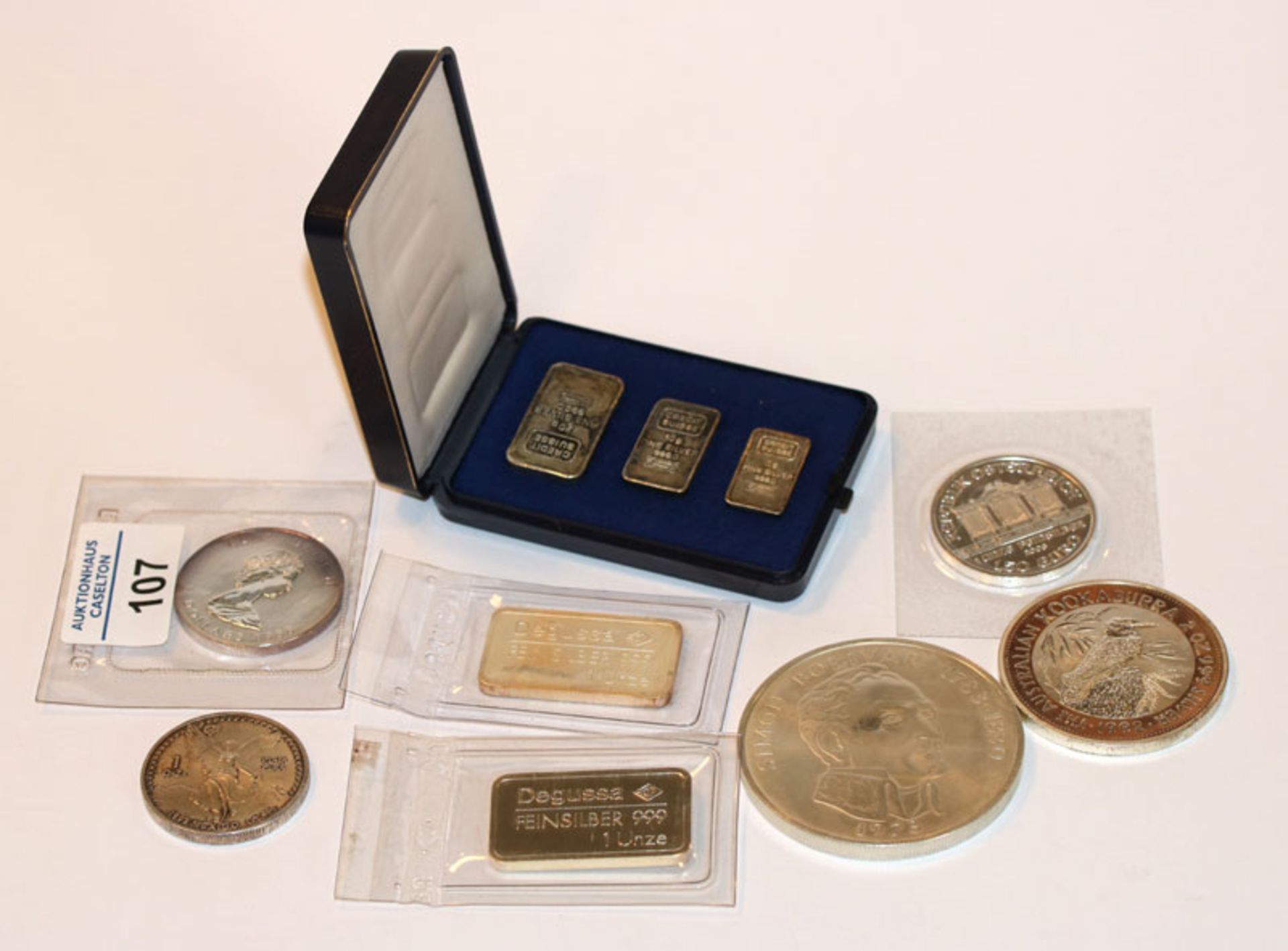 7 Silber Unzen, 35 gr. Feinsilber und 20 Balboas Panama 120 gr. Feinsilber, zus. 372 gr. Feinsilber