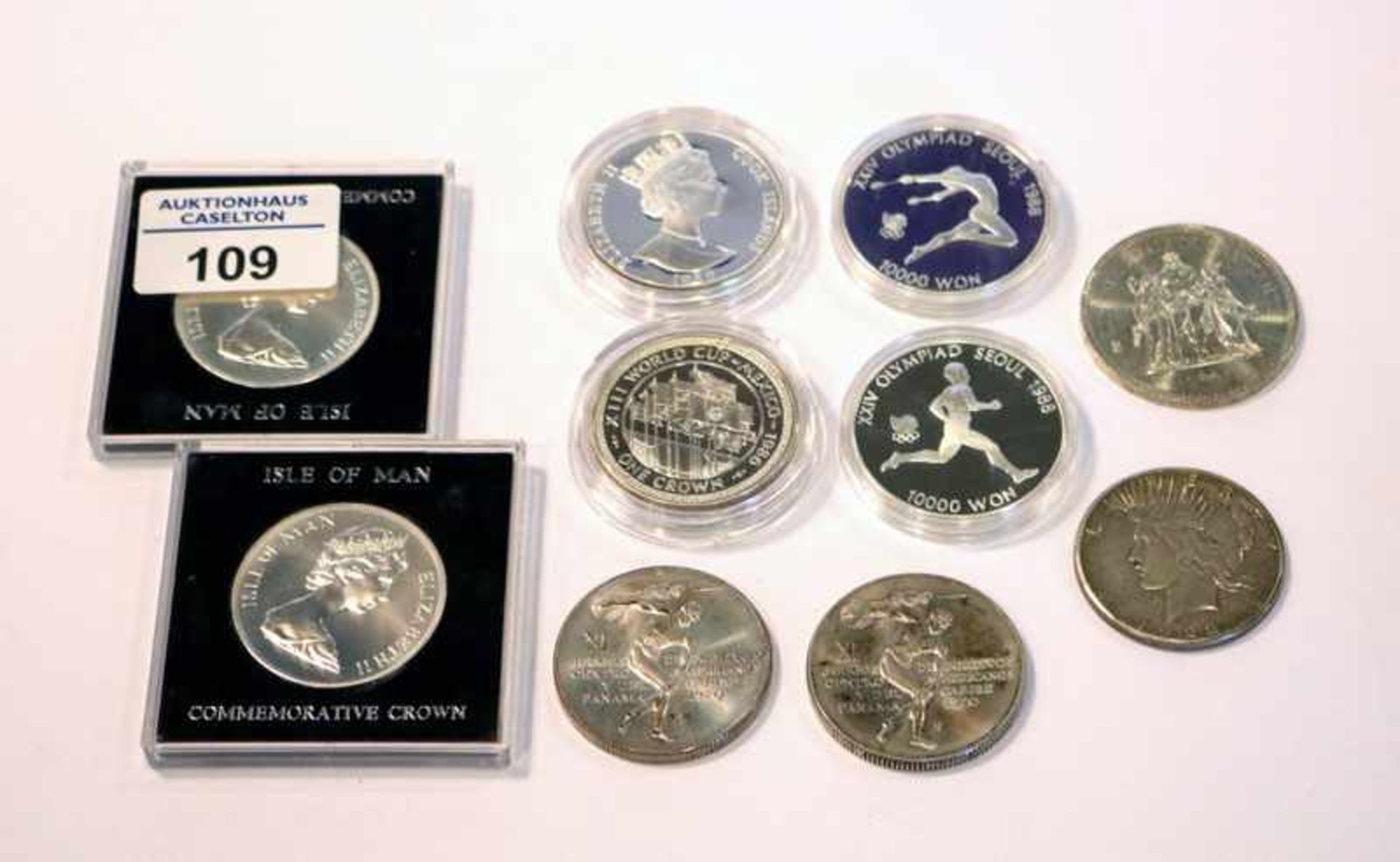 10 diverse Weltmünzen, teils polierte Platte, 252 gr. Sterlingsilber, 56,7 gr. 900 Silber
