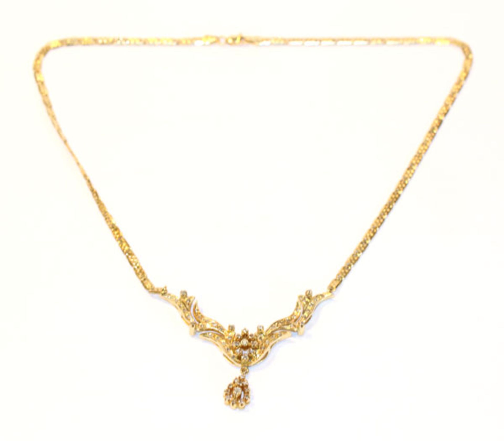 14 k Gelbgold Collier, Mittelteil mit Diamanten ausgefaßt, 19 gr., L 40 cm, feine Handarbeit