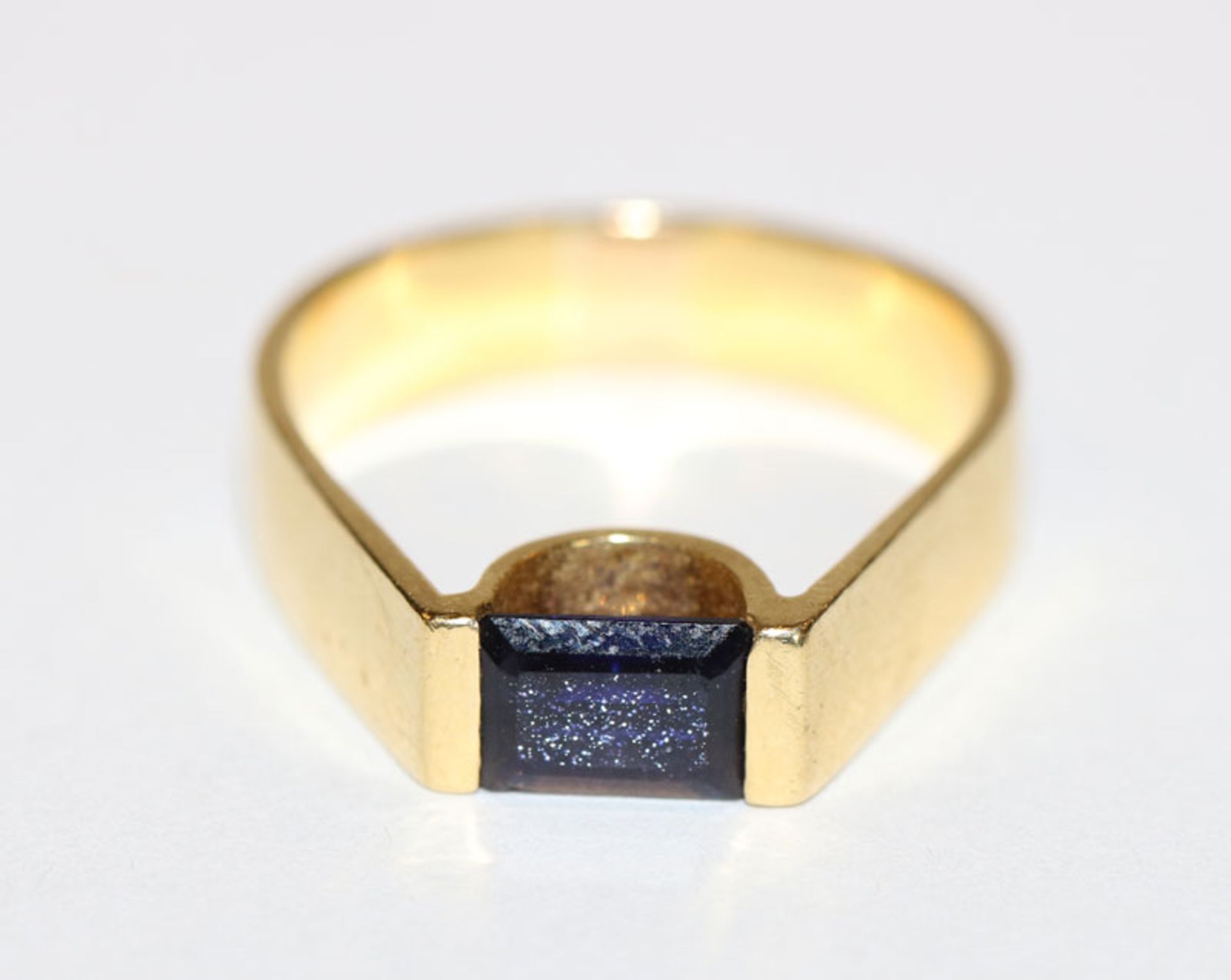 18 k Gelbgold Spannring mit Safir, leicht bestossen, Gr. 57, 6,5 gr.