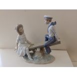 A Lladro figure group – Seesaw.