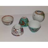 Two Chinese porcelain tea bowls and three other pieces. (5)