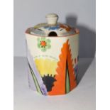 An art deco Arthur Wood preserve jar , painted in the Clarice Cliff style.