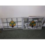 A set of five small stained glass leaded light window panels.