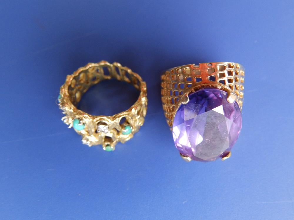 A modern turquoise & diamond set '750' dress ring and an amethyst set 9ct ring. (2)