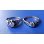 A diamond solitaire – approximately 0.50 carat and one other. (2)