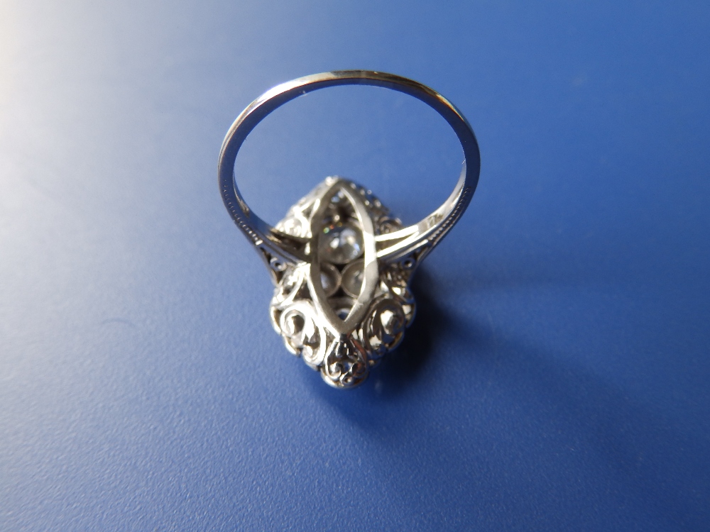 A diamond set white metal cocktail ring, having four millegrain set old cut stones to centre, - Bild 2 aus 2