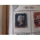 A postage stamp album including a Penny Black and a small quantity of early GB.