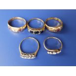 Two small diamond rings and three others. (5)
