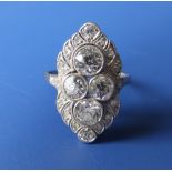 A diamond set white metal cocktail ring, having four millegrain set old cut stones to centre,