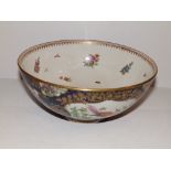 A 19thC Worcester style blue scale ground fruit bowl decorated with an exotic bird, 9.5” diameter.