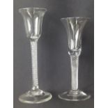 A tall 18thC multi-ply air twist wine glass with bell bowl, 7.75” and one other. (2)