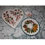 An Esther Weeks Exon Wemyss heart-shaped tray, 12”, a circular plate and a small seated pig. (3)