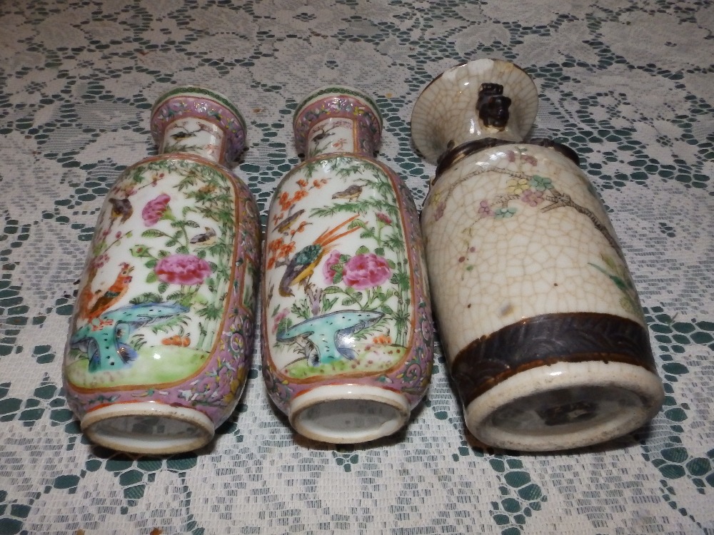 A small pair of 19thC Cantonese famille rose rouleau vases, 7.25” and one other. (3) - Image 2 of 2