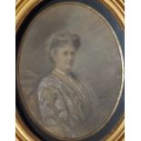 Early 20thC School – a small oval pastel drawing – Portrait of a woman, monogrammed 'FE' (?),