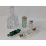 Two silver top cut glass scent bottles, two double-ended scent bottles and one other. (5)